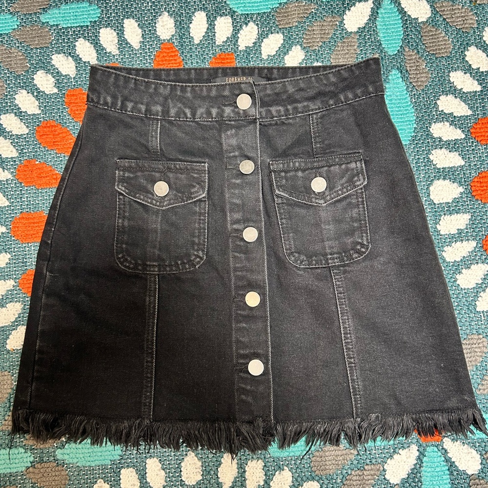 Forever 21 size small button up black denim skirt with frayed bottom